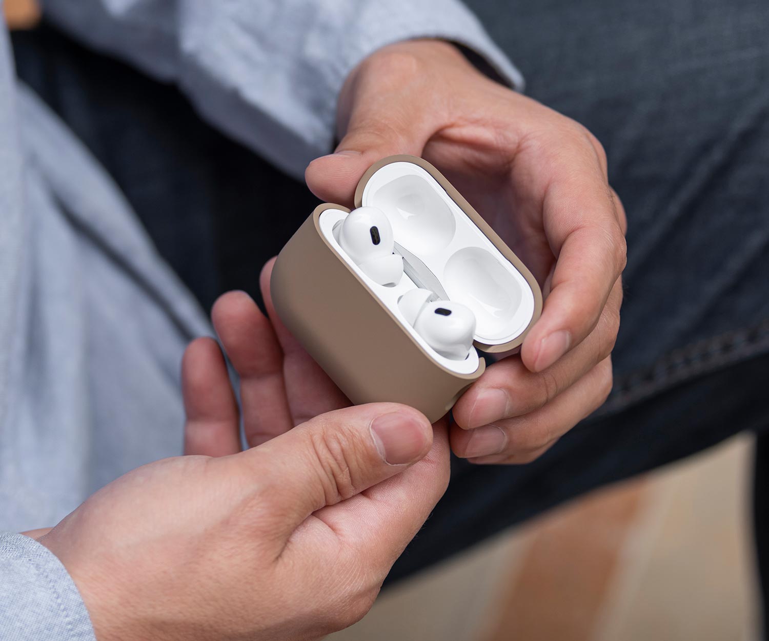 hands opening airpods 2 pro case